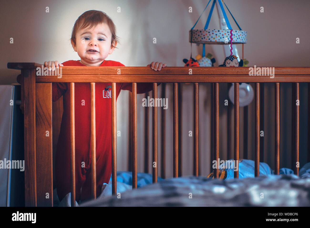 Baby Crying Crib High Resolution Stock Photography and Images Alamy