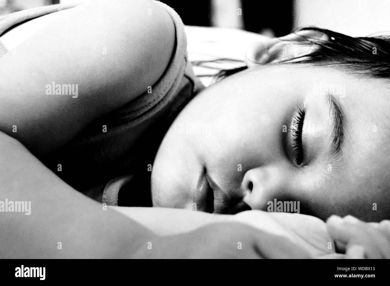 Indian girl sleeping bed hi-res stock photography and images - Alamy