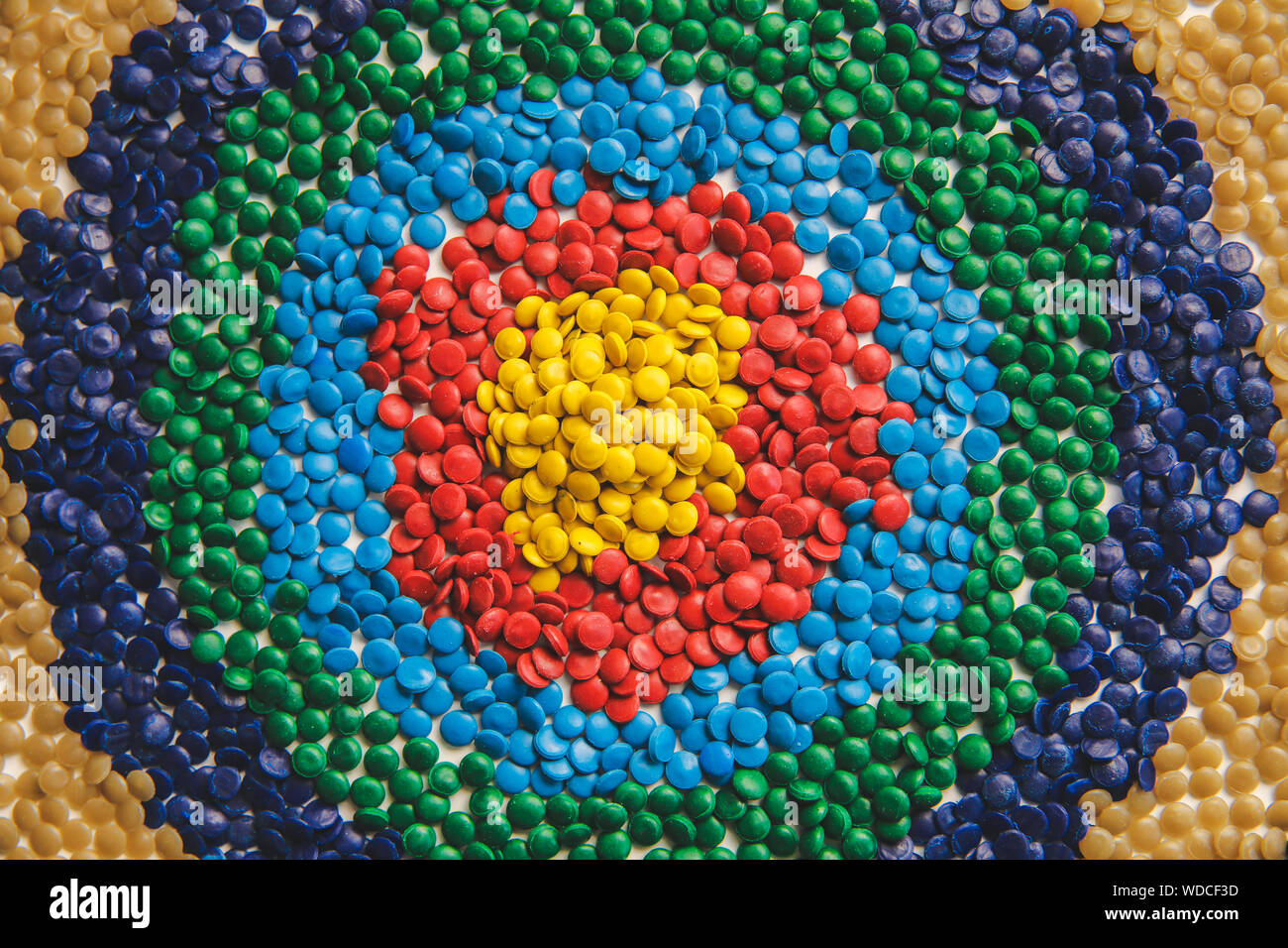 Industrial colorful Polymeric dye. Plastic pellets. Colorant for