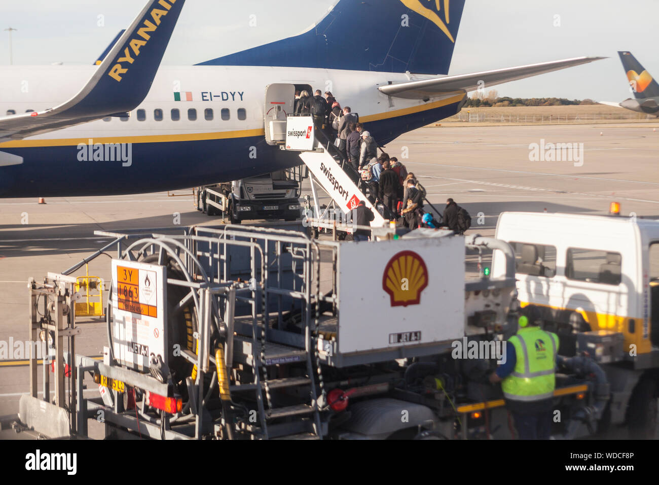Passengers board a Ryanair plane at Stansted Airport, London, UK. Stock Photo