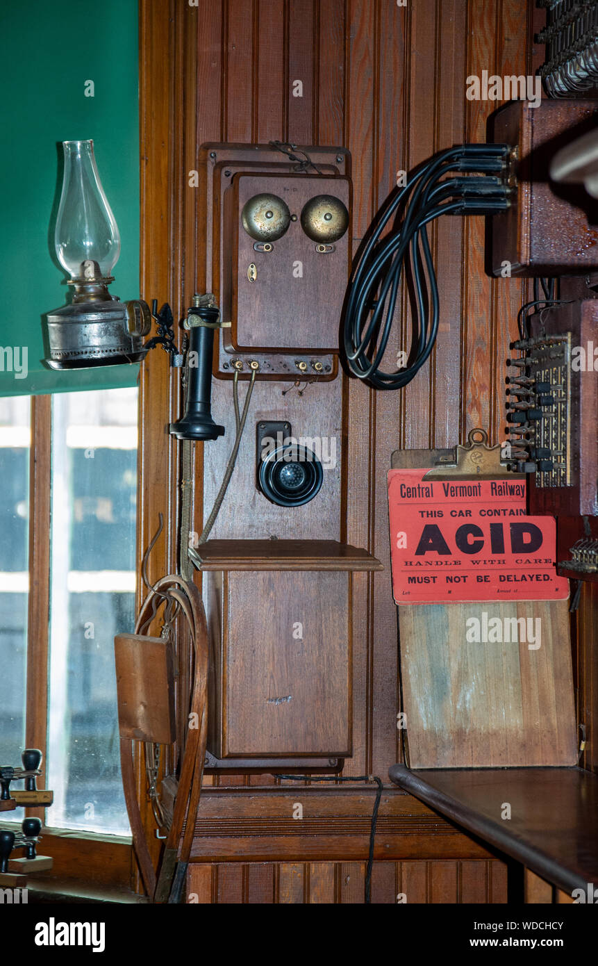 antique telephone in old train station Stock Photo