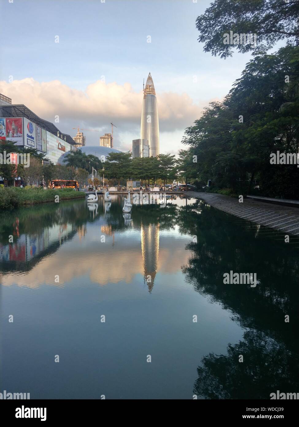 Reflection Of Tower In Water Stock Photo