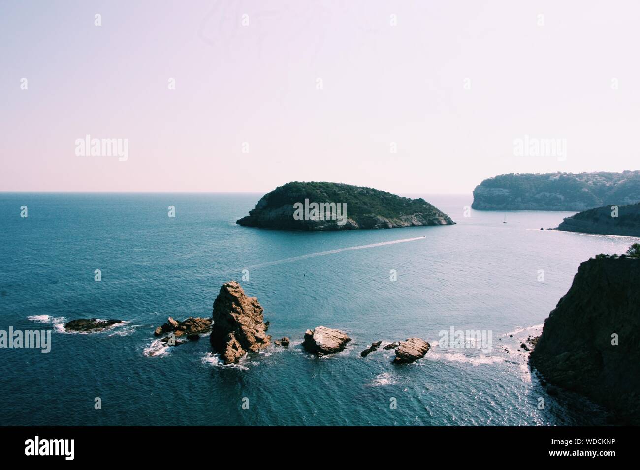 Aerial view rocks under turquoise hi-res stock photography and images ...