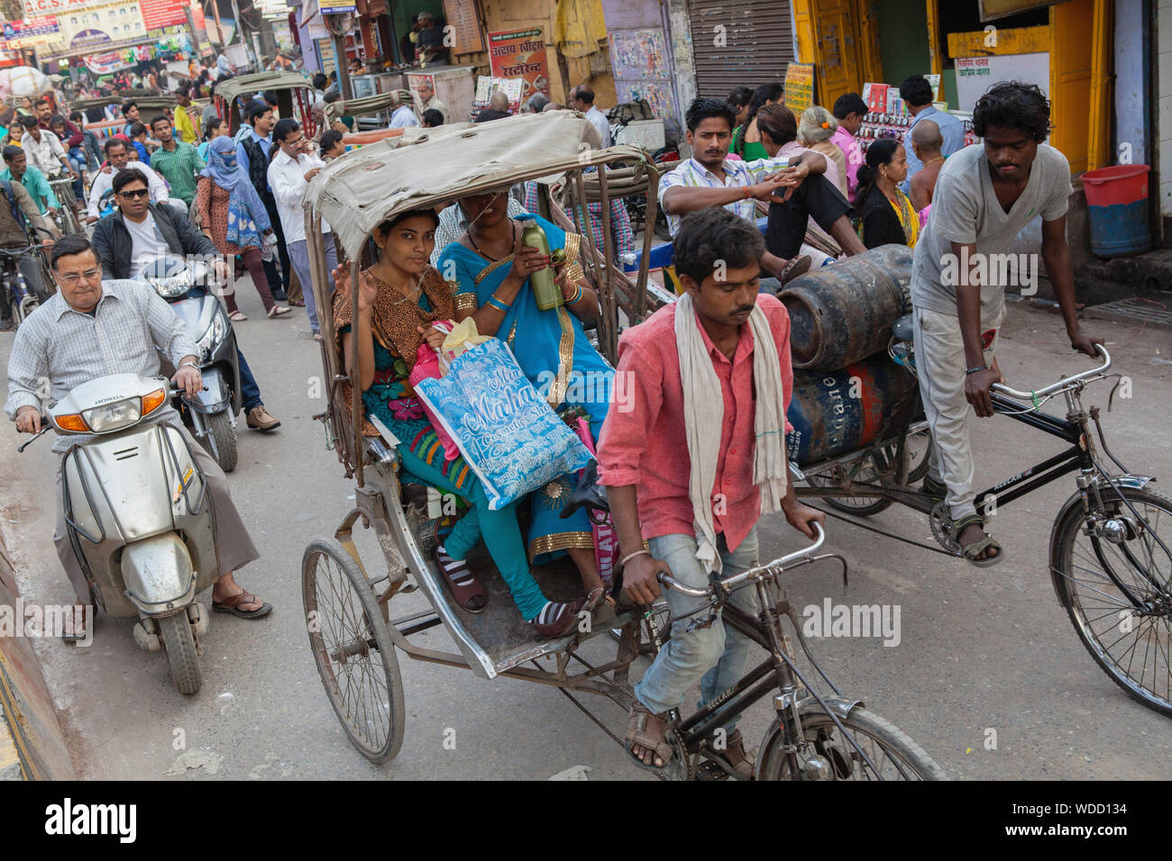 Varanasi Rickshaws India, Uttar Pradesh, Varanasi, Cycle rickshaws and motorcyclists in ...