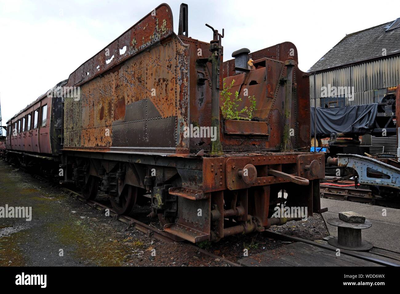 A former Great Western Railway 3500 gallon locomotive tender awaiting restoration at Didcot Railway Centre, Oxfordshire Stock Photo