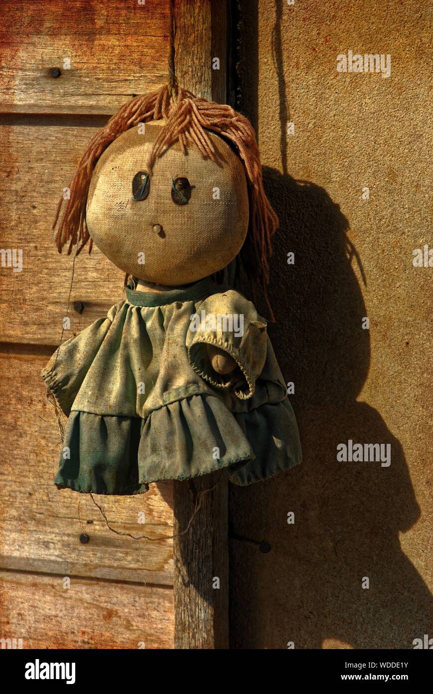 old wooden doll