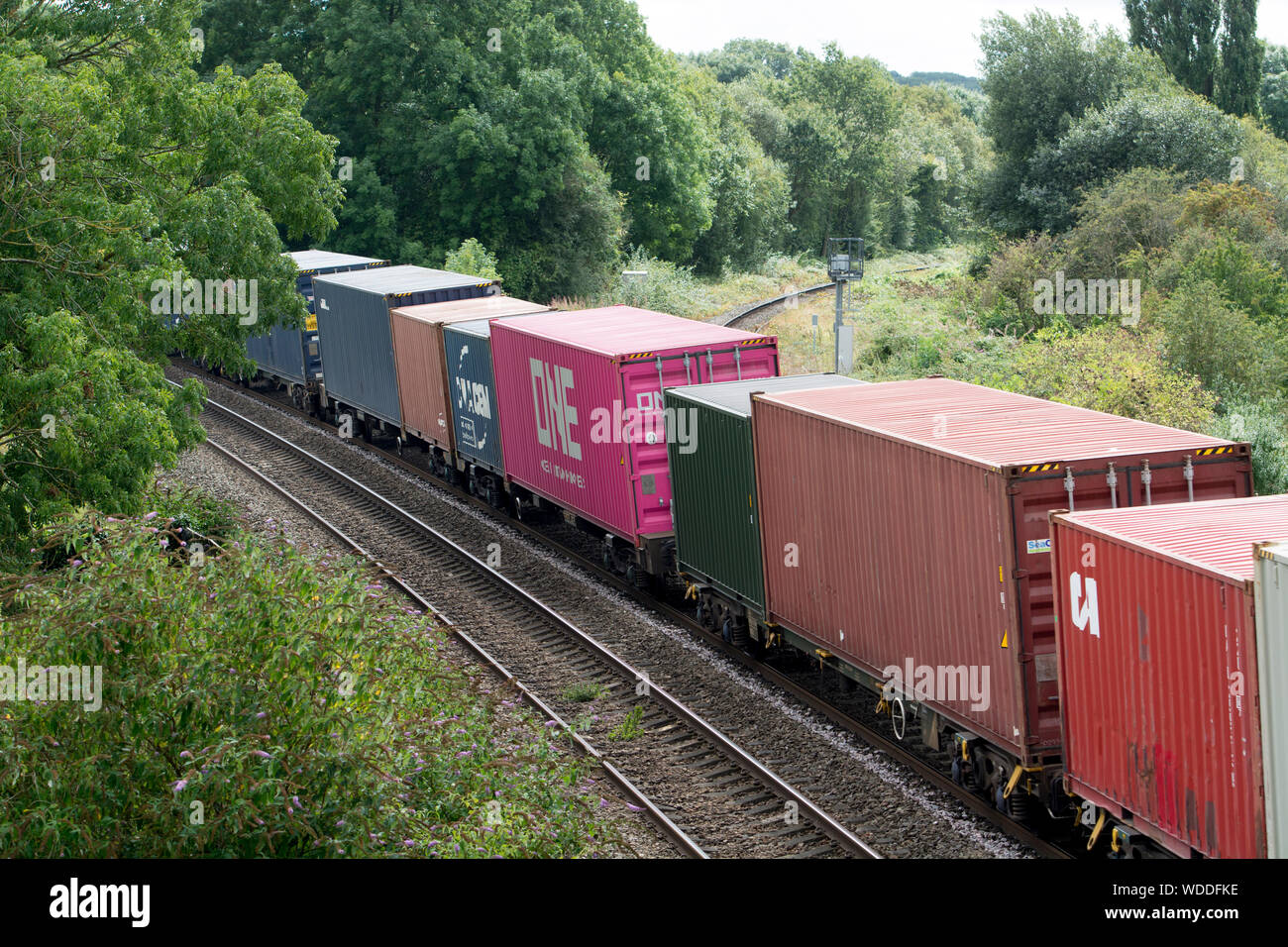 Shipping containers on a train, Warwickshire, UK Stock Photo Alamy