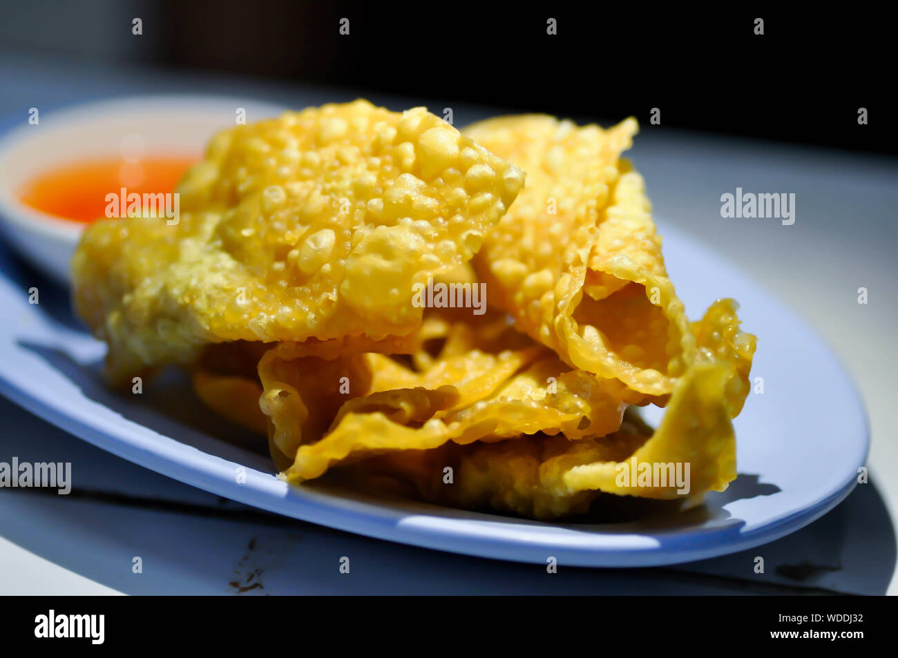 fried wonton, deep fried wontons with dip Stock Photo Alamy