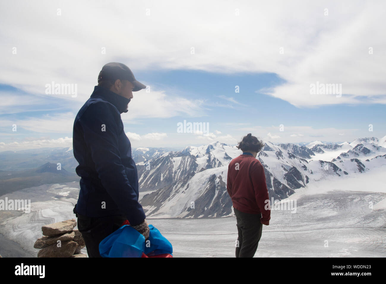 Alpinists in the summit of Malchin Peak in Altain Mountains, Mongolia Stock Photo
