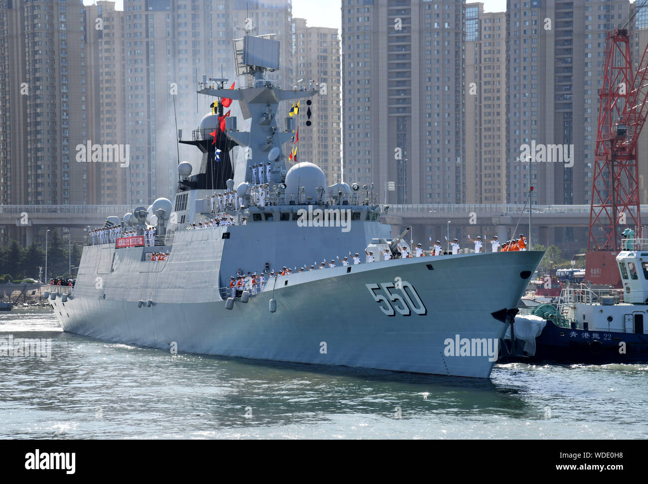 (190829) -- QINGDAO, Aug. 29, 2019 (Xinhua) -- Frigate Weifang leaves from a port in Qingdao, east China's Shandong Province, Aug. 29, 2019. The 33rd fleet from the Chinese People's Liberation Army (PLA) Navy on Thursday left the port city of Qingdao in east China's Shandong Province for the Gulf of Aden to escort civilian ships. (Xinhua/Li Ziheng) Stock Photo