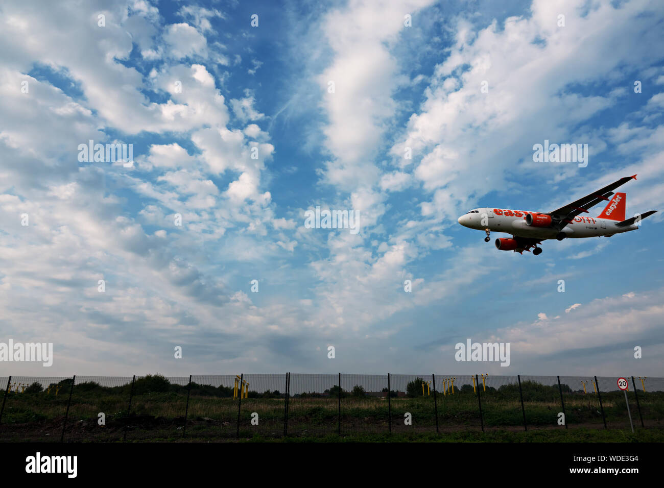 An Easyjet plane coming in to land at Liverpool John Lennon airport Stock Photo