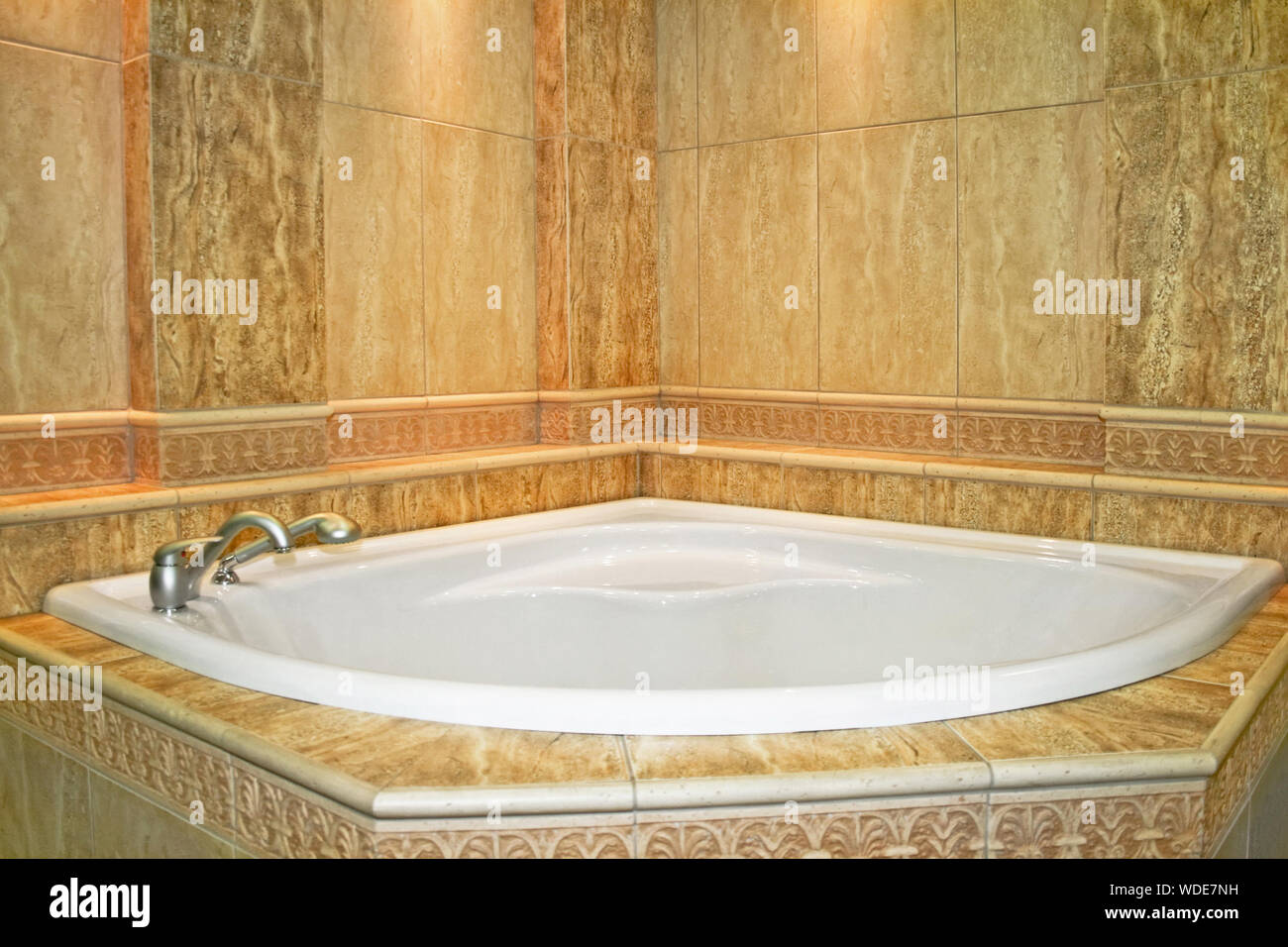 Big spa bath tub in marble bathroom Stock Photo