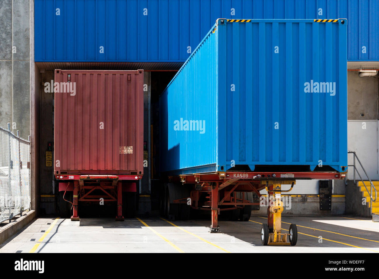 Industrial shipping containers parked on hard stand Stock Photo Alamy