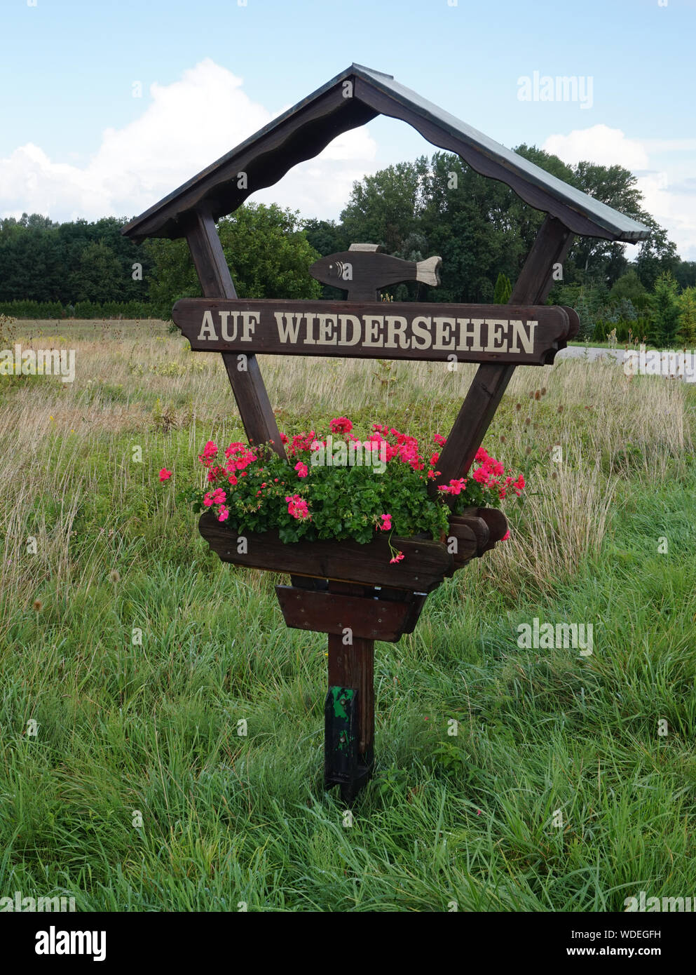 The German Words Auf Wiedersehen Meaning Until Next Time In English On A Wooden Fence In Austria Stock Photo Alamy
