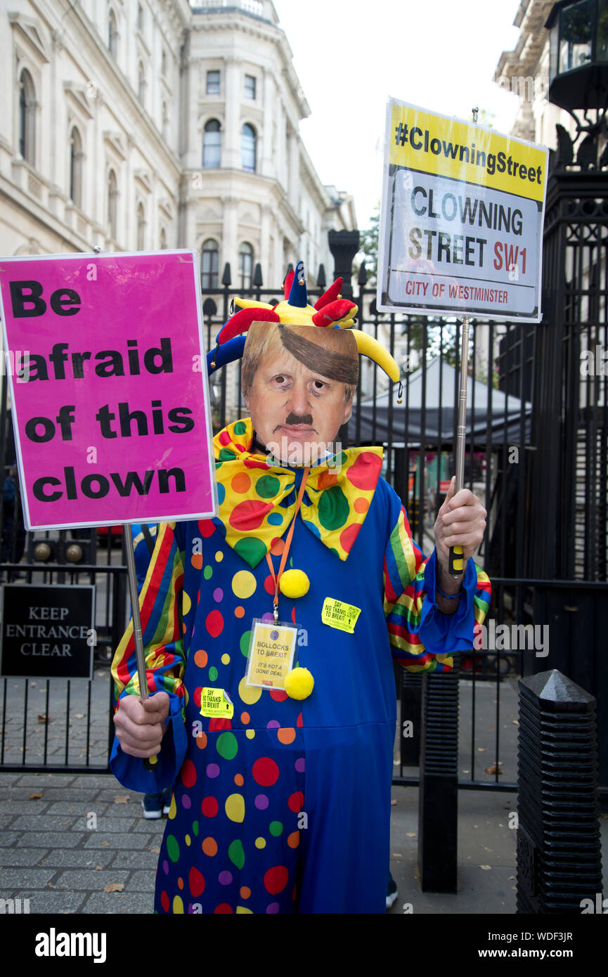 Whitehall, August 29th 2019. Remain protest the day after Boris Johnson announces the prorogation of Parliament. A man dressed as a clown with a Boris Stock Photo