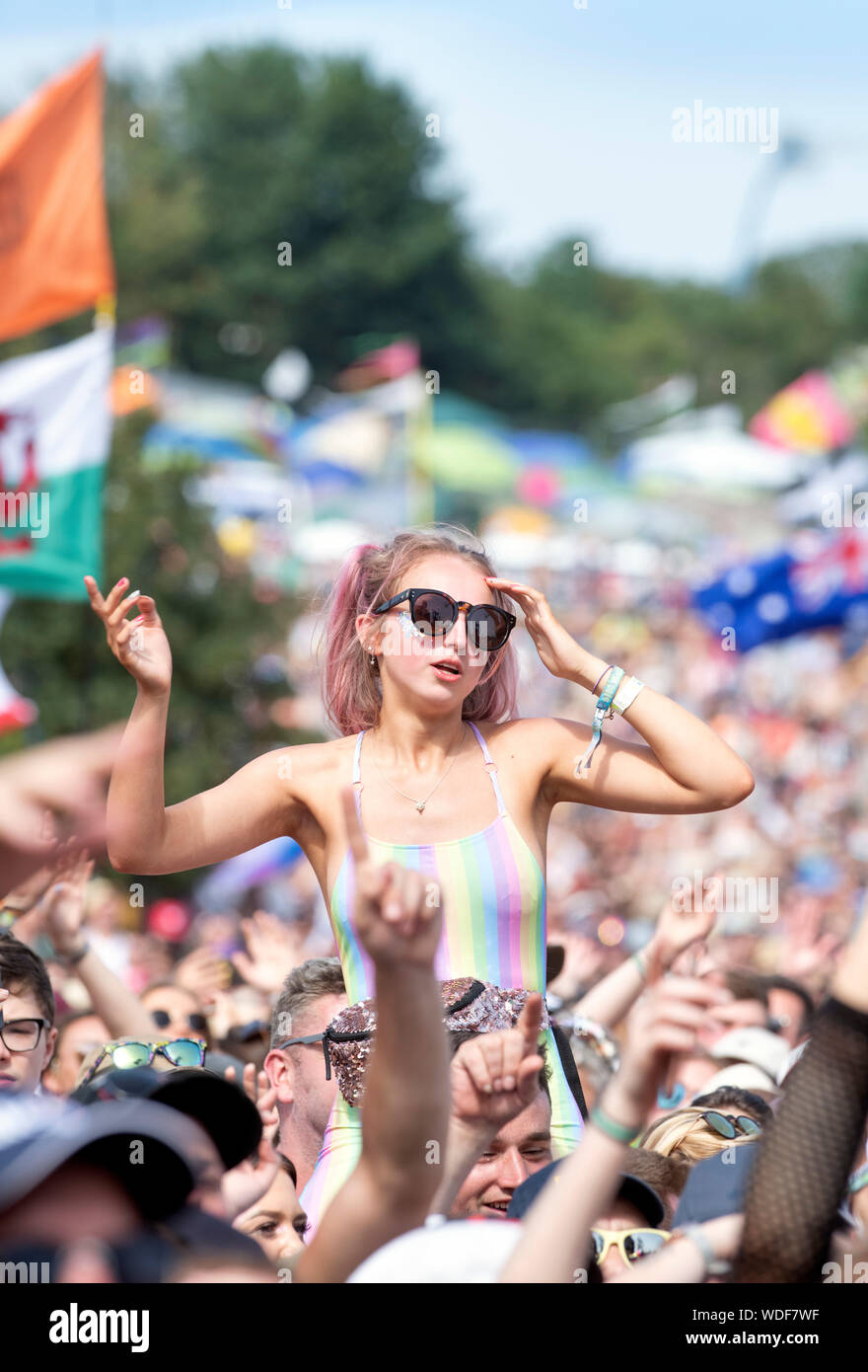 A Bastille fan at the Pyramid Stage at the Glastonbury Festival 2019 in Pilton, Somerset Stock Photo