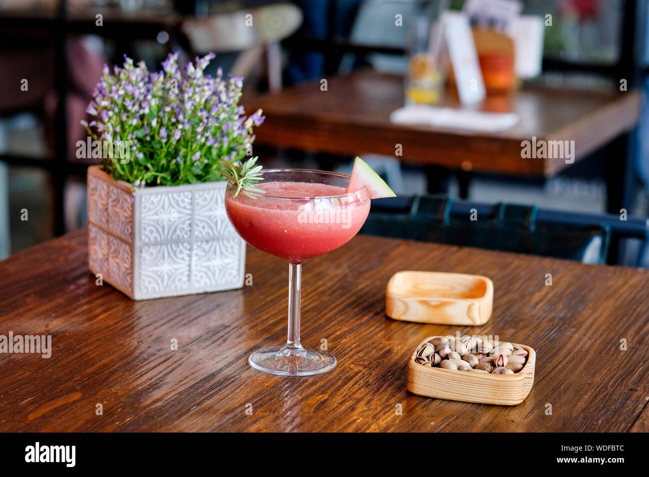 Refreshing cold summer drink watermelon Slushie with basil Stock Photo