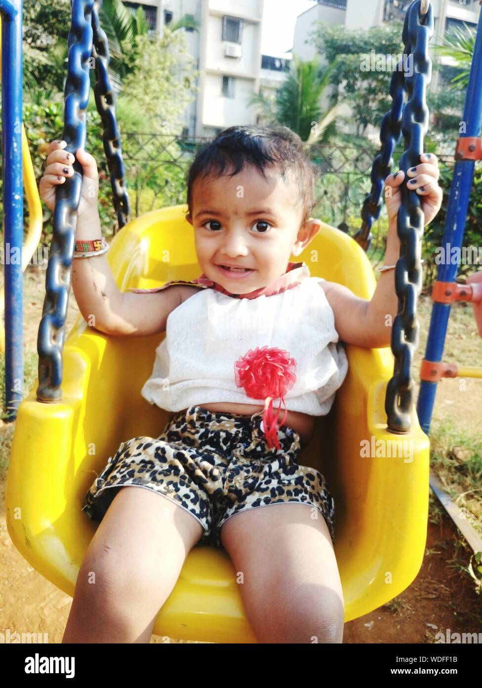 Baby swing park hires stock photography and images Alamy