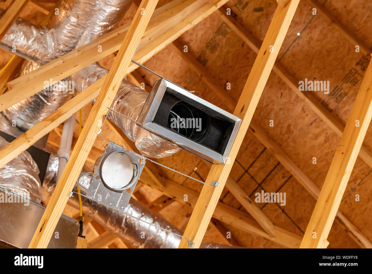 New air conditioner vents in new home construction Stock Photo