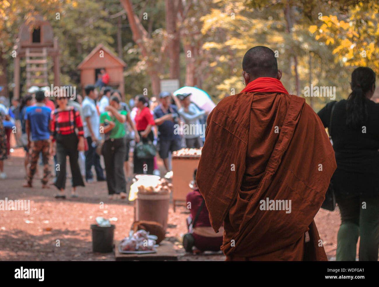 Rear View Of Monk Walking At Religious Place Stock Photo