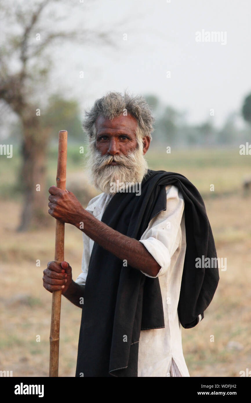 Senior man with cane standing hi-res stock photography and images - Alamy