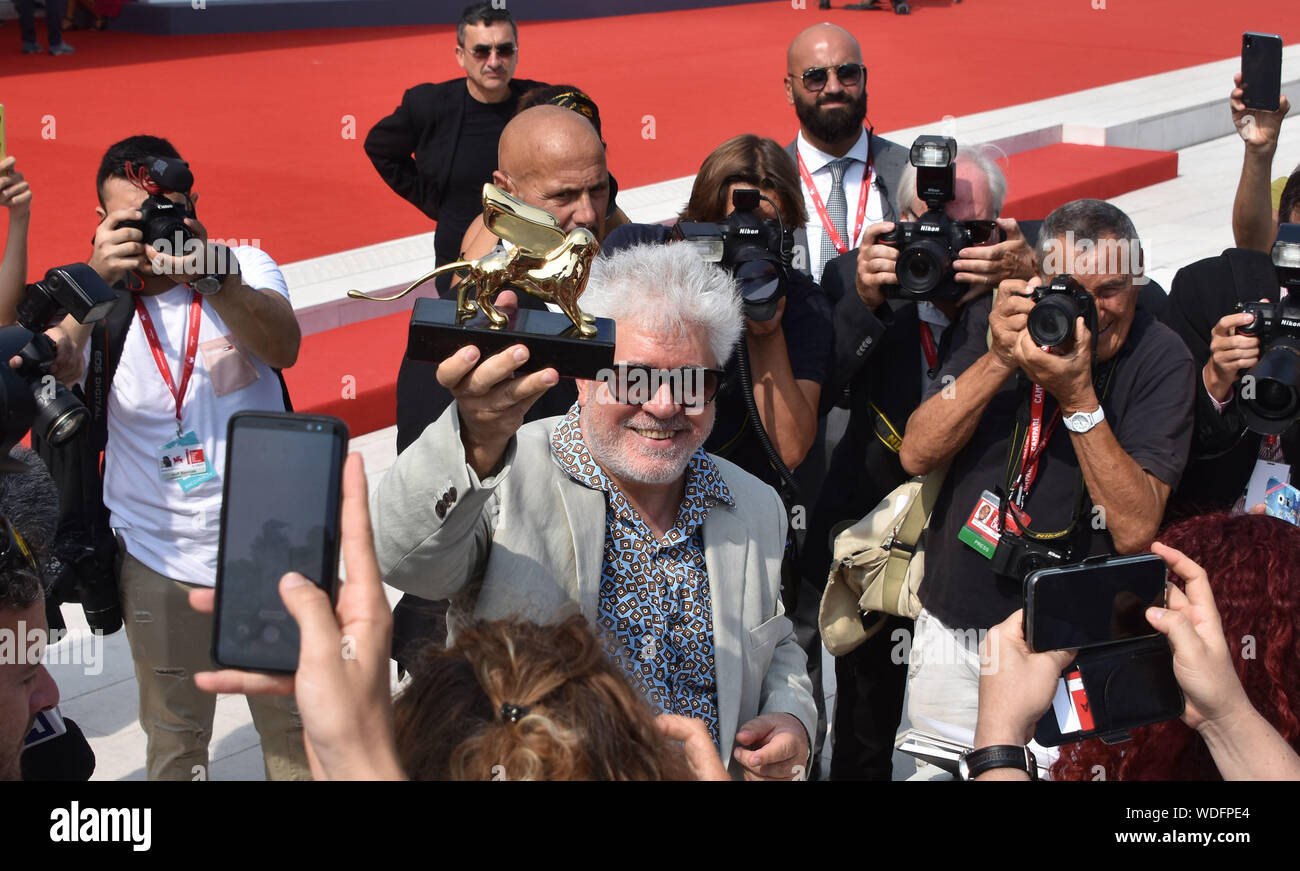 VENICE, Italy. 29th Aug, 2019. Pedro Almodovar shows the Golden Lion at Palazzo del Cinema after receiving it for lifetime achievements during the 76th Venice Film Festival on August 29, 2019 in Venice, Italy. Credit: Andrea Merola/Awakening/Alamy Live News Stock Photo