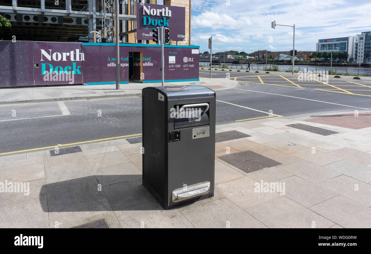 Recycling: A solar powered refuse compactor bin near the North Dock of the River Liffey, Dublin, Ireland. Stock Photo