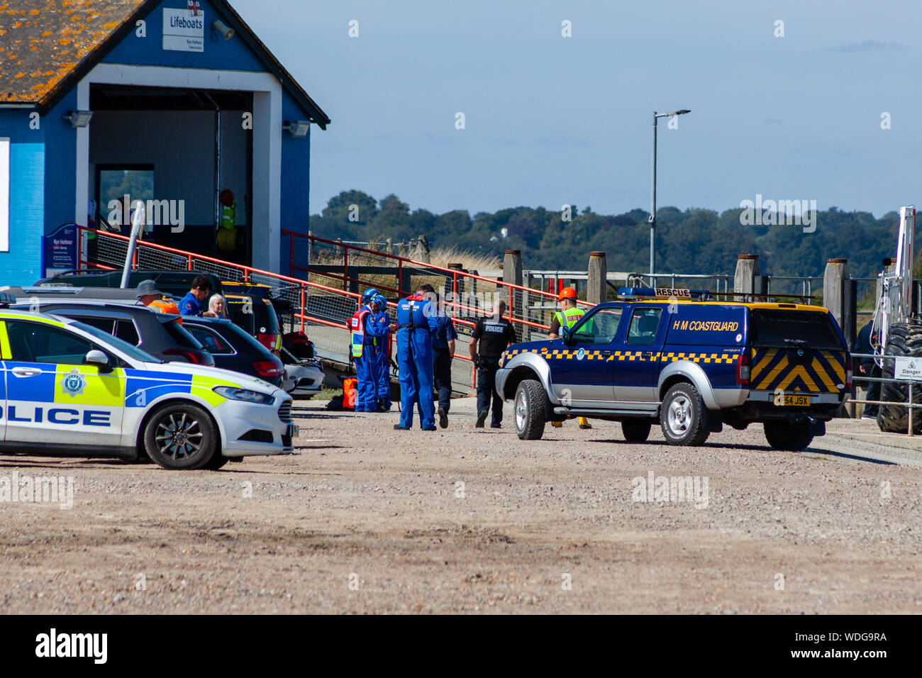 Police and HM Coastguard vehicles. Stock Photo