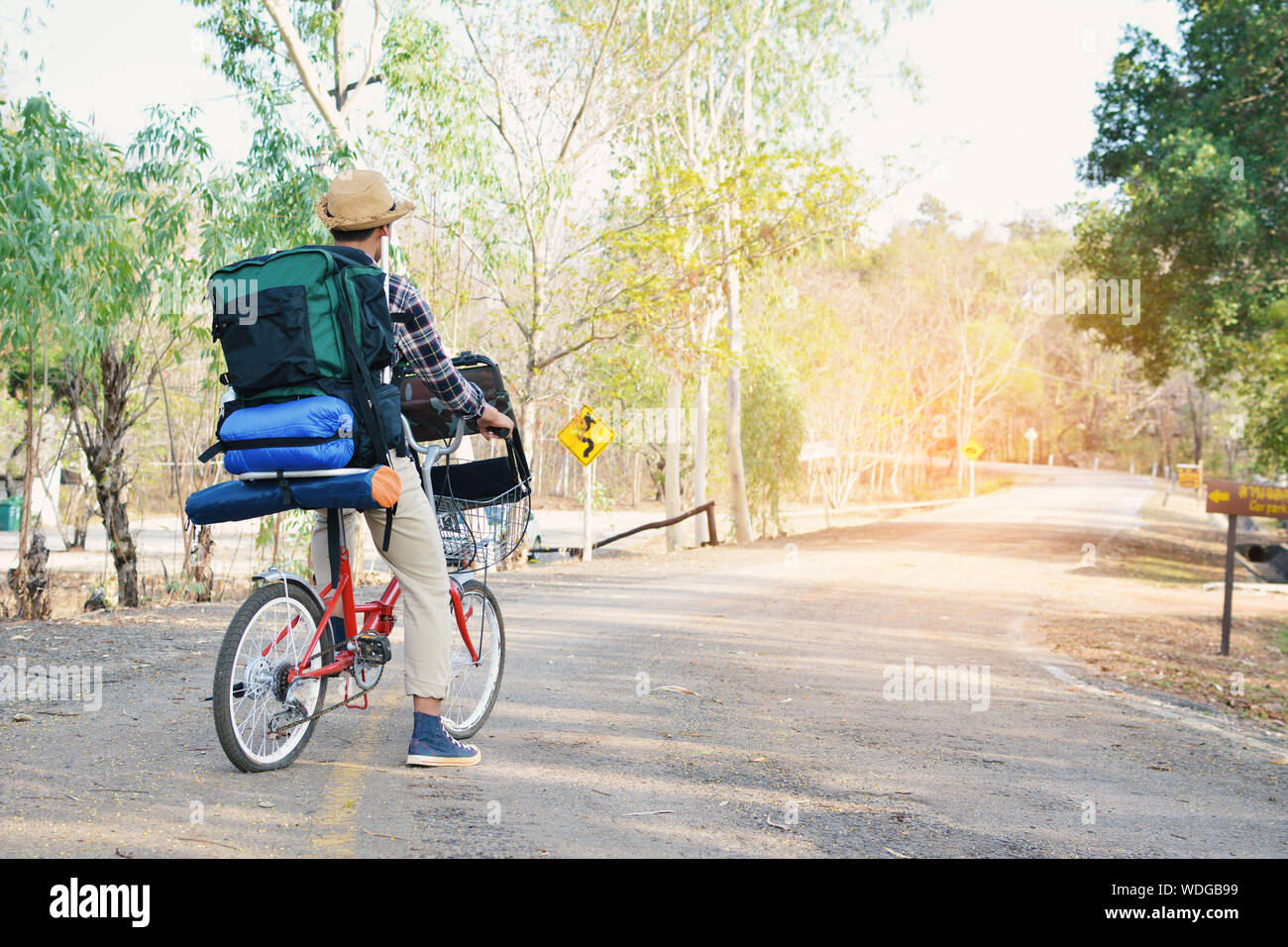 Man riding bicycle road hi-res stock photography and images - Alamy