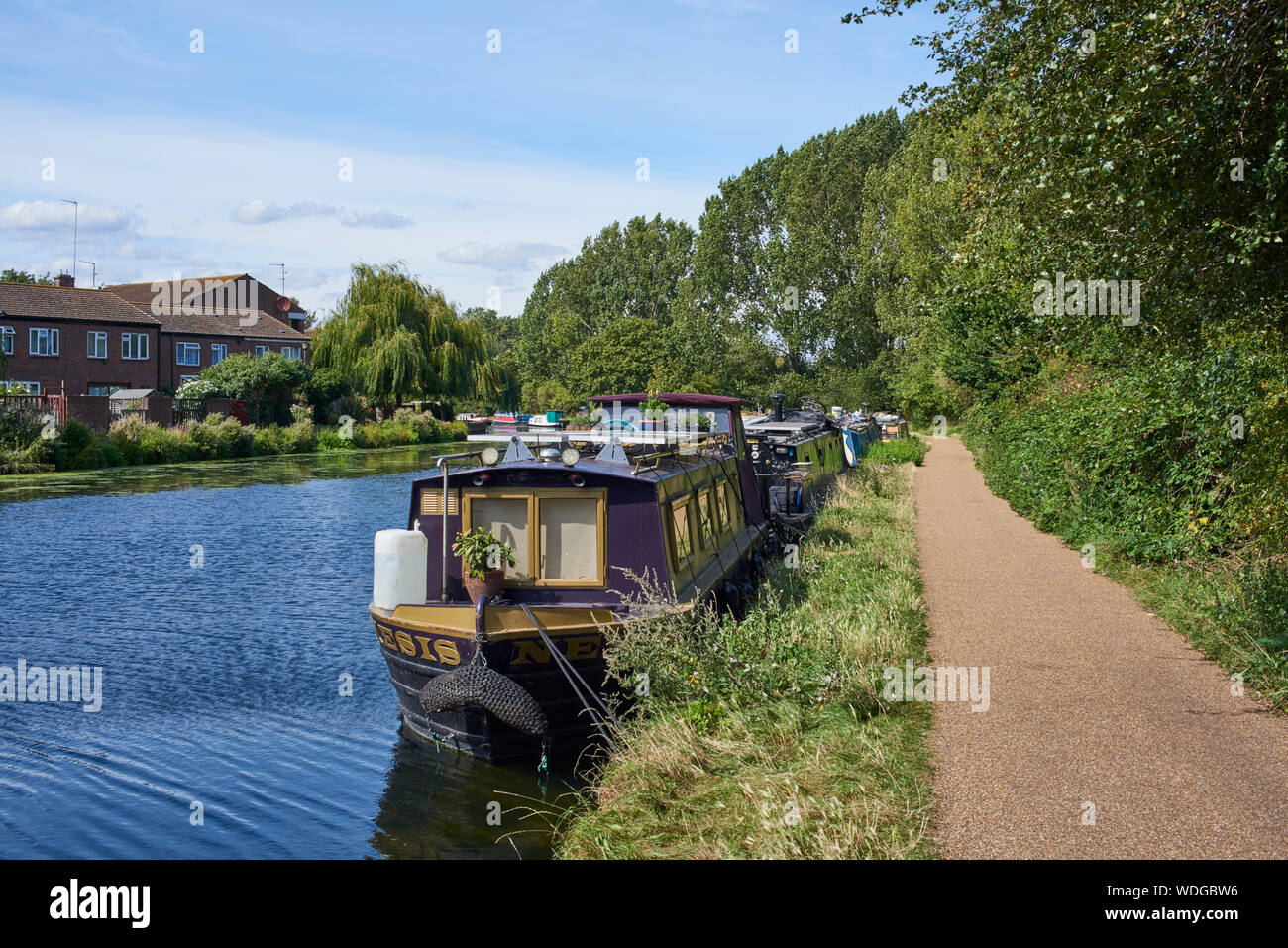 Narrowboats along the River Lea Navigation near Hackney Marshes, North East London UK Stock Photo