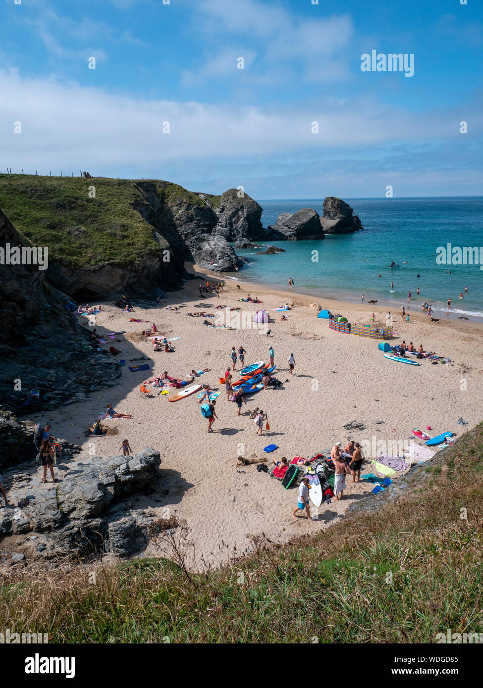 The beach at Porthcothan Bay, on the north Cornwall coast, Cornwall UK on a busy summer day. Stock Photo