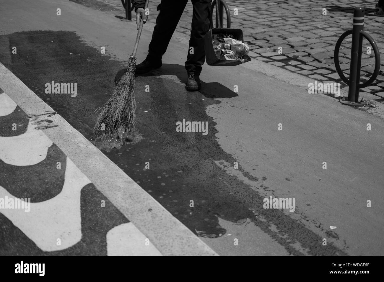 Sweeping the road hires stock photography and images Alamy