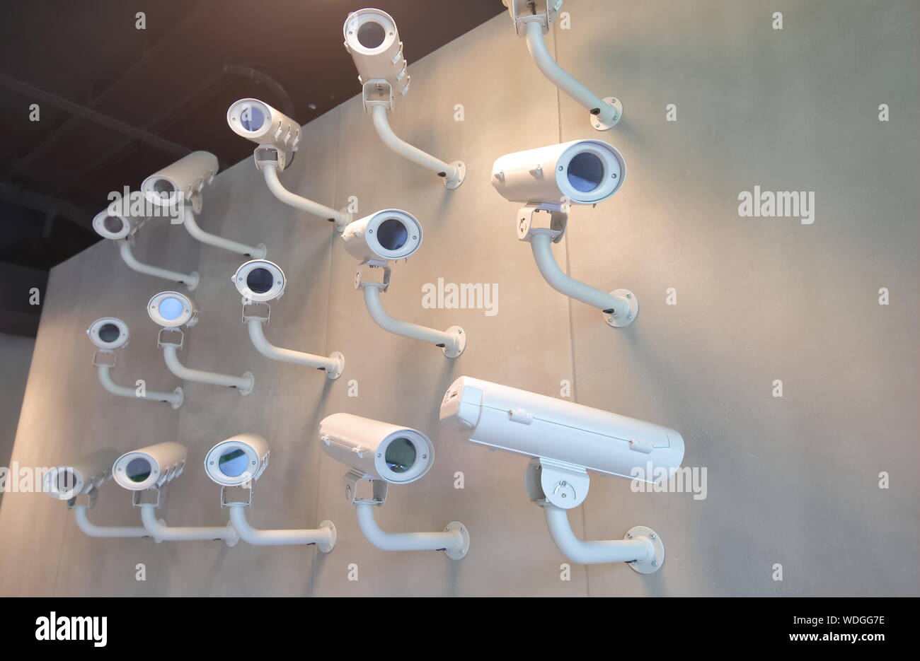 Surveillance video camera on wall Stock Photo Alamy