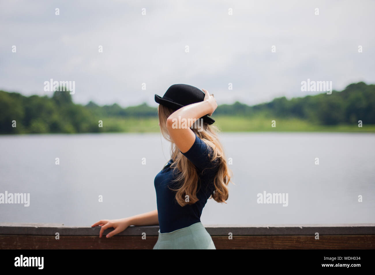 Woman with bowler hat hi-res stock photography and images - Alamy
