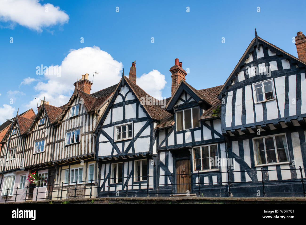 Tudor timber framed black and white medieval houses in the high street.  Warwick, Warwickshire, England Stock Photo