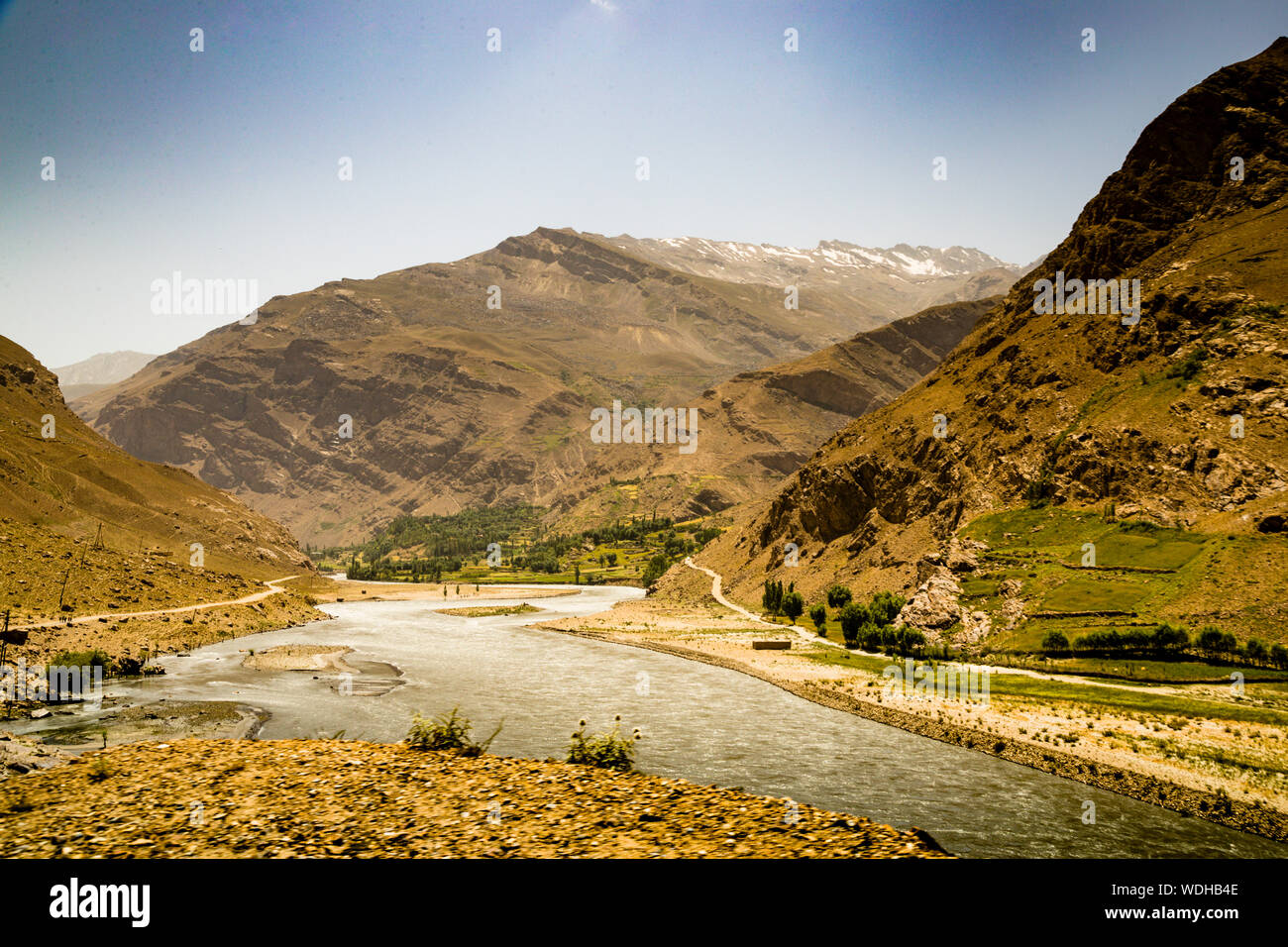 Silk Road near Malvoj, Tajikistan and Afghanistan on the opposite Side of the River Panj Stock Photo