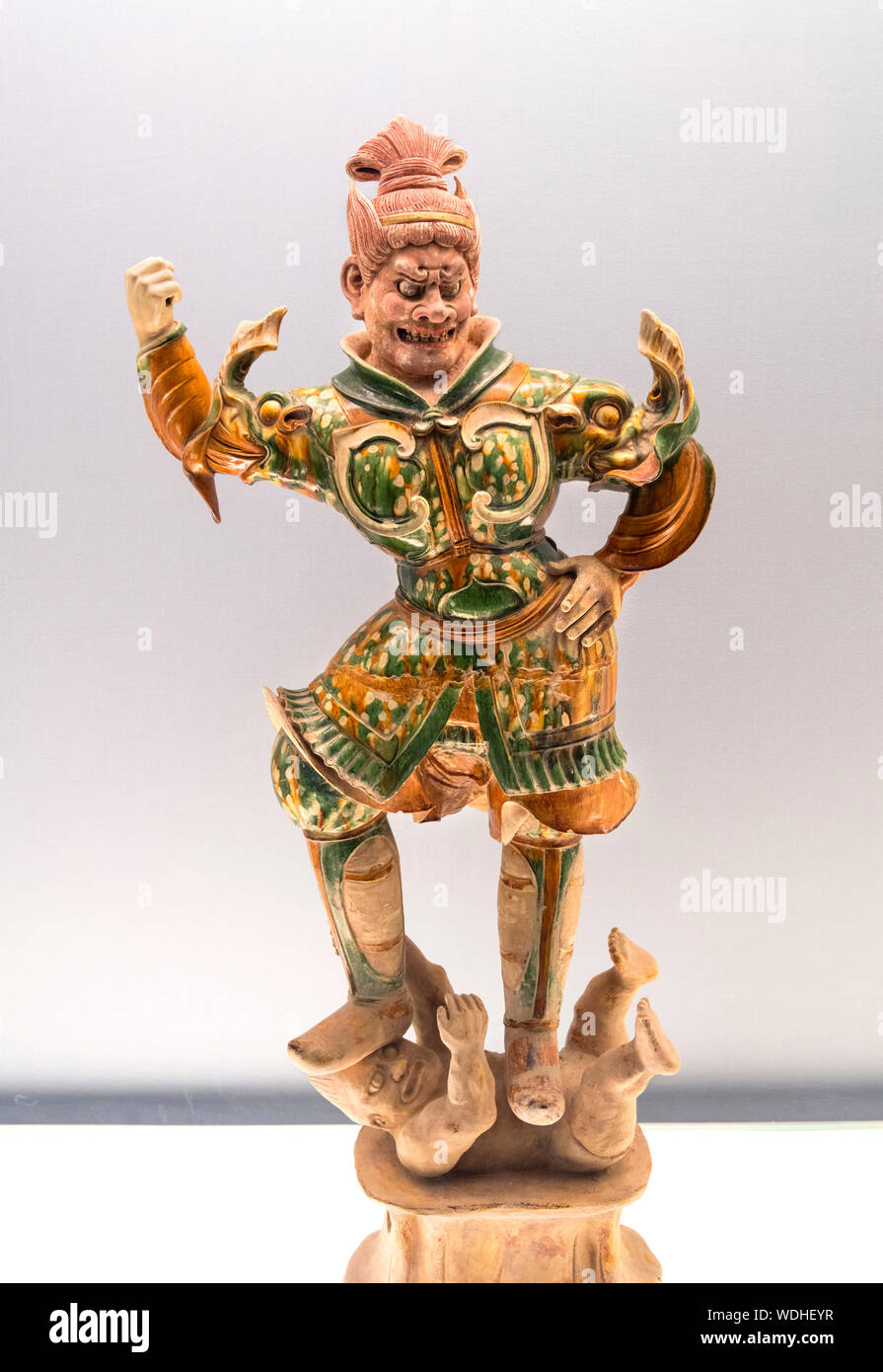 Polychrome glazed pottery statue of Heavenly Guardian, Tang Dynasty (619-907 AD) Stock Photo