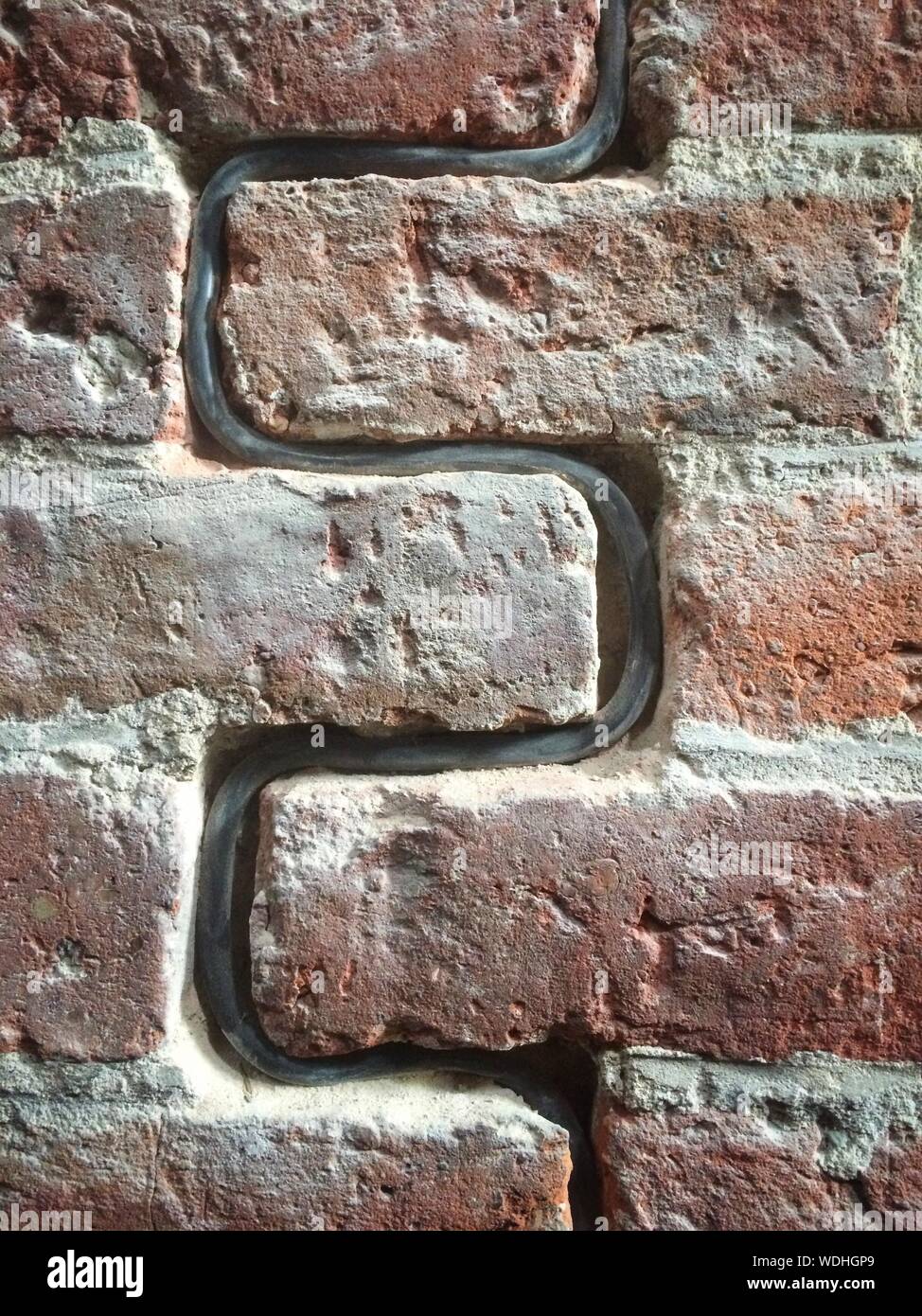 Closeup Of Pipe In Brick Wall Stock Photo Alamy