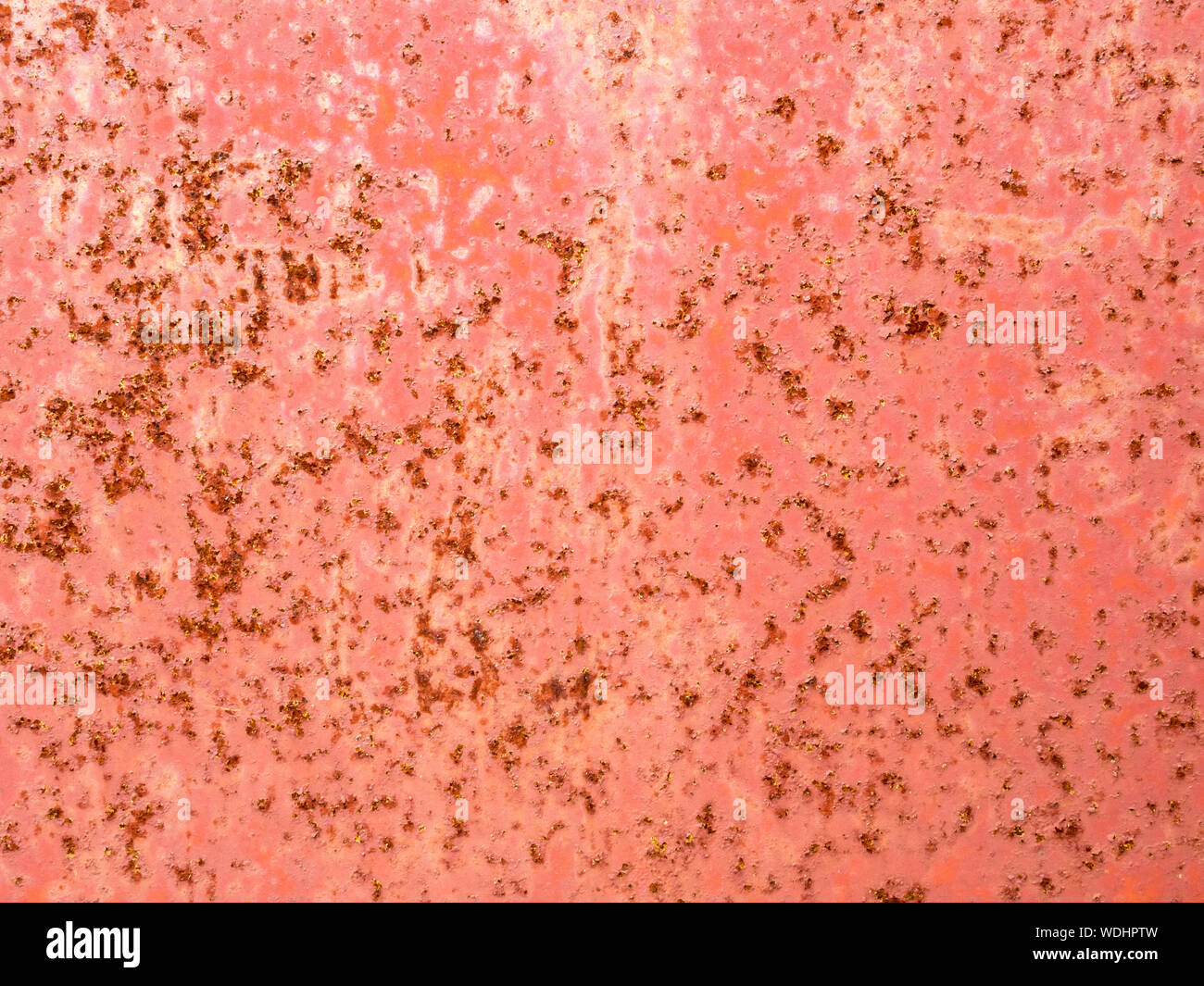 Red painted rusty wall. Abstract grunge texture background. Copy space, empty template for text Stock Photo