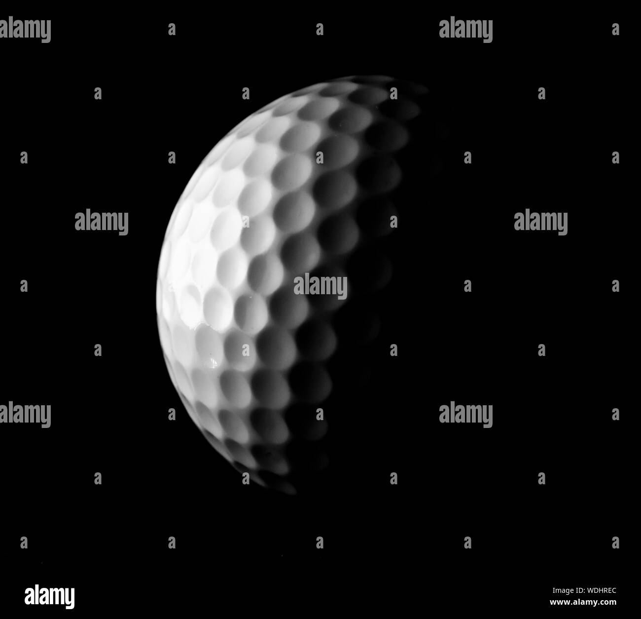 A golf ball as a descending moon Stock Photo Alamy