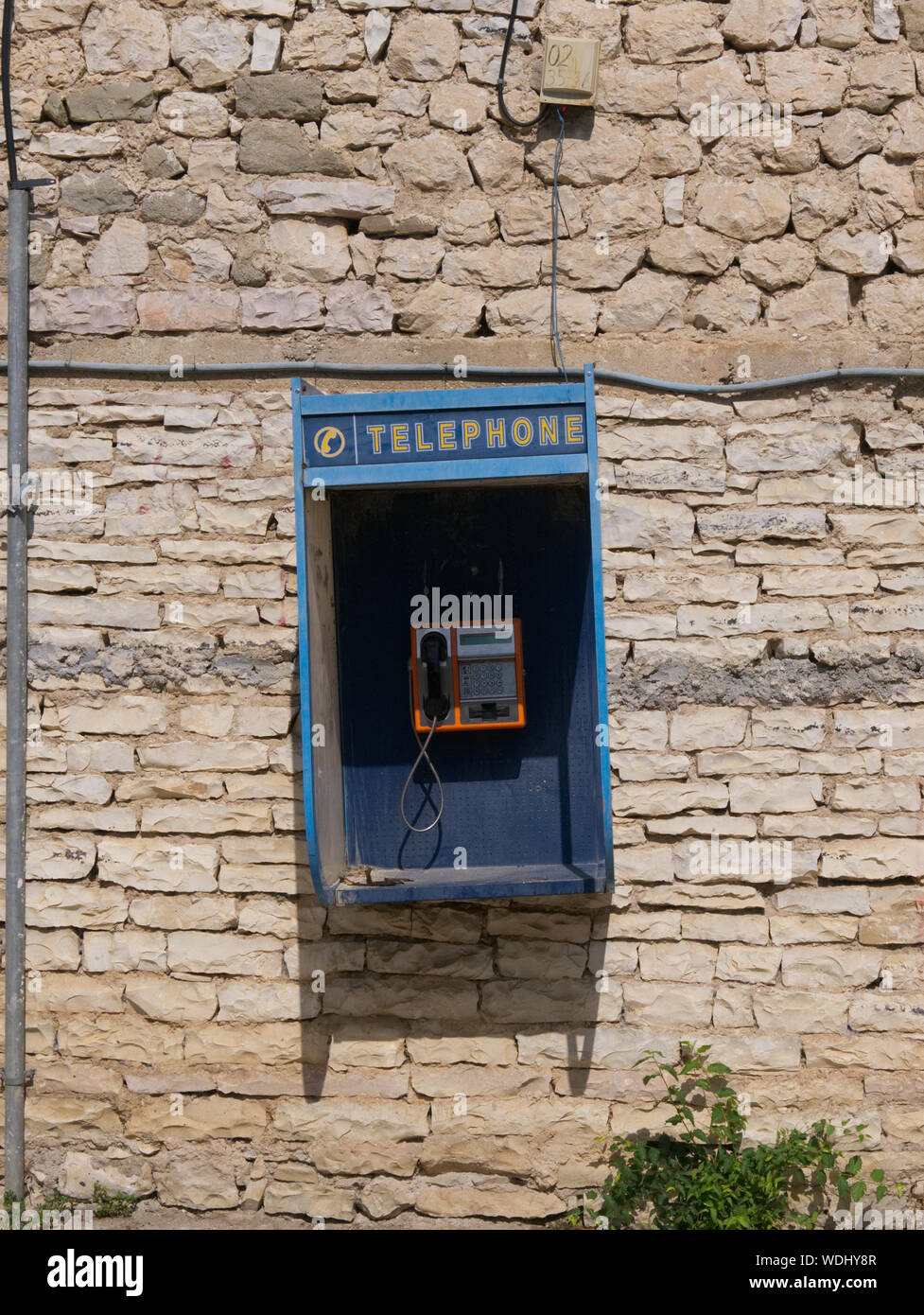 Old telephone mounted on wall hi-res stock photography and images - Alamy