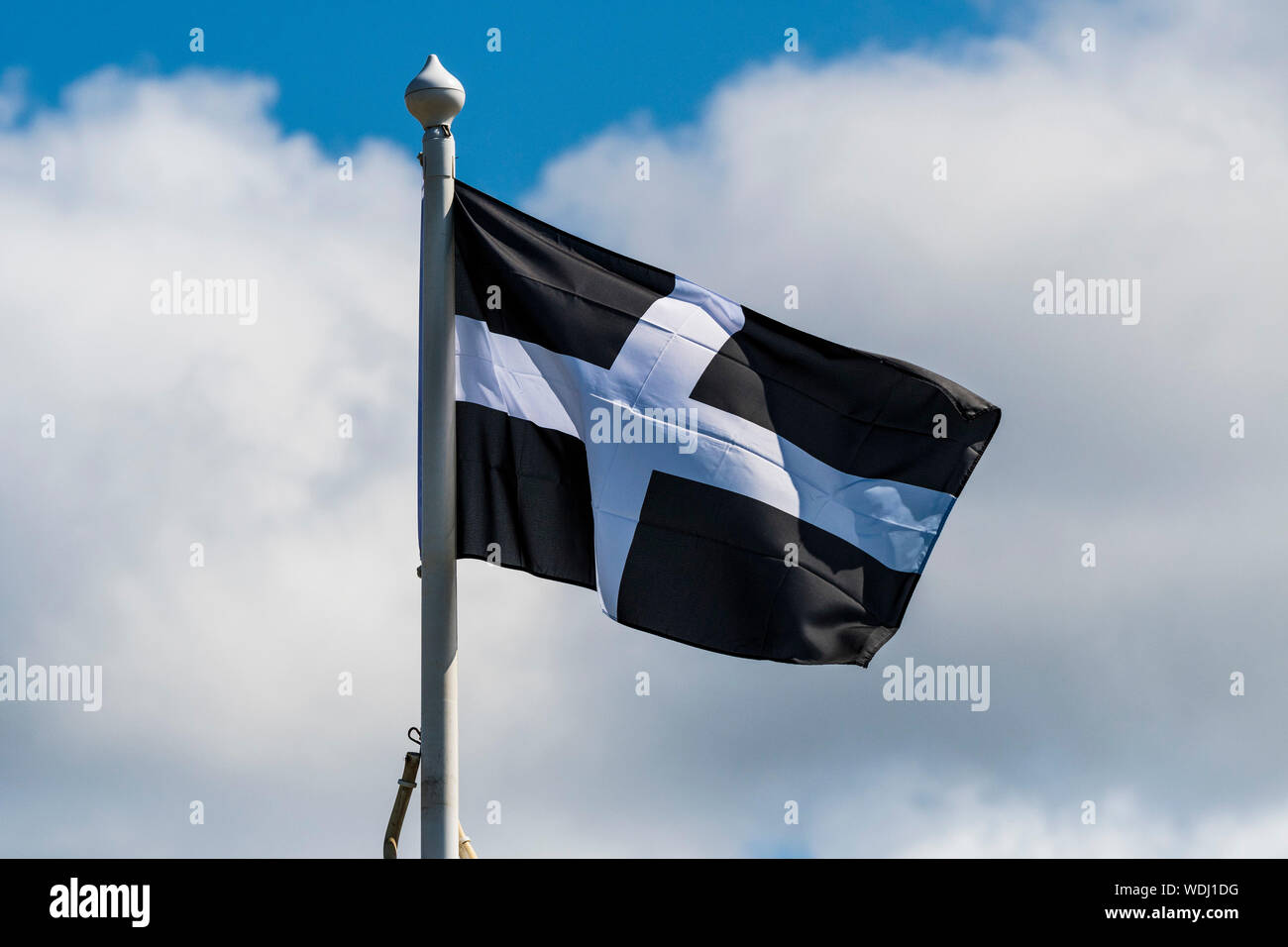 St Piran Flag.  The flag of Cornwall. Cornish flag. Stock Photo