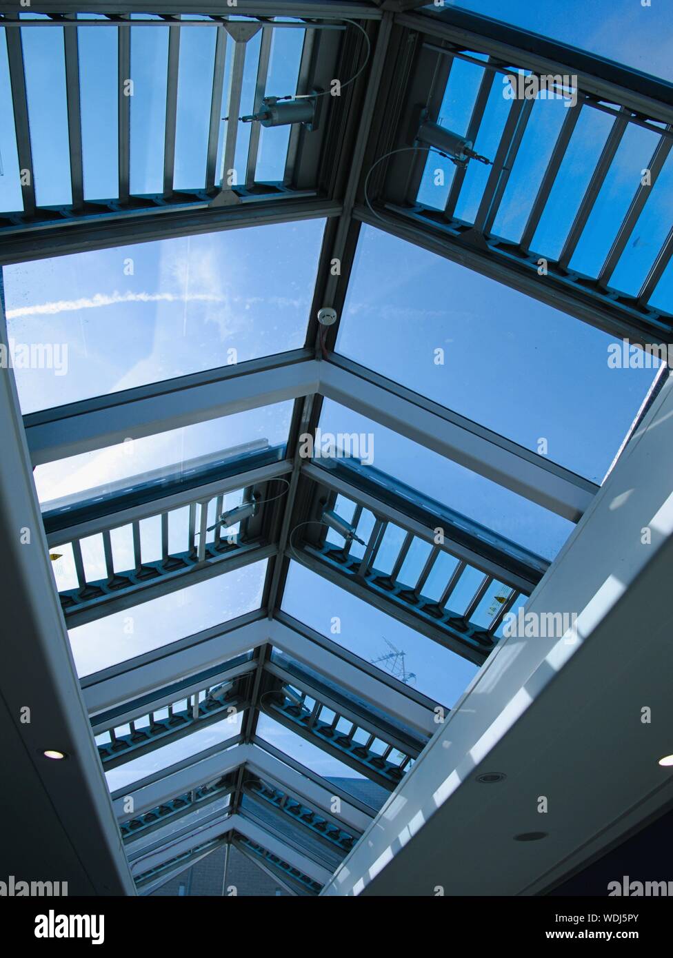 Opening louver windows in the glass roof of the Packhorse shopping