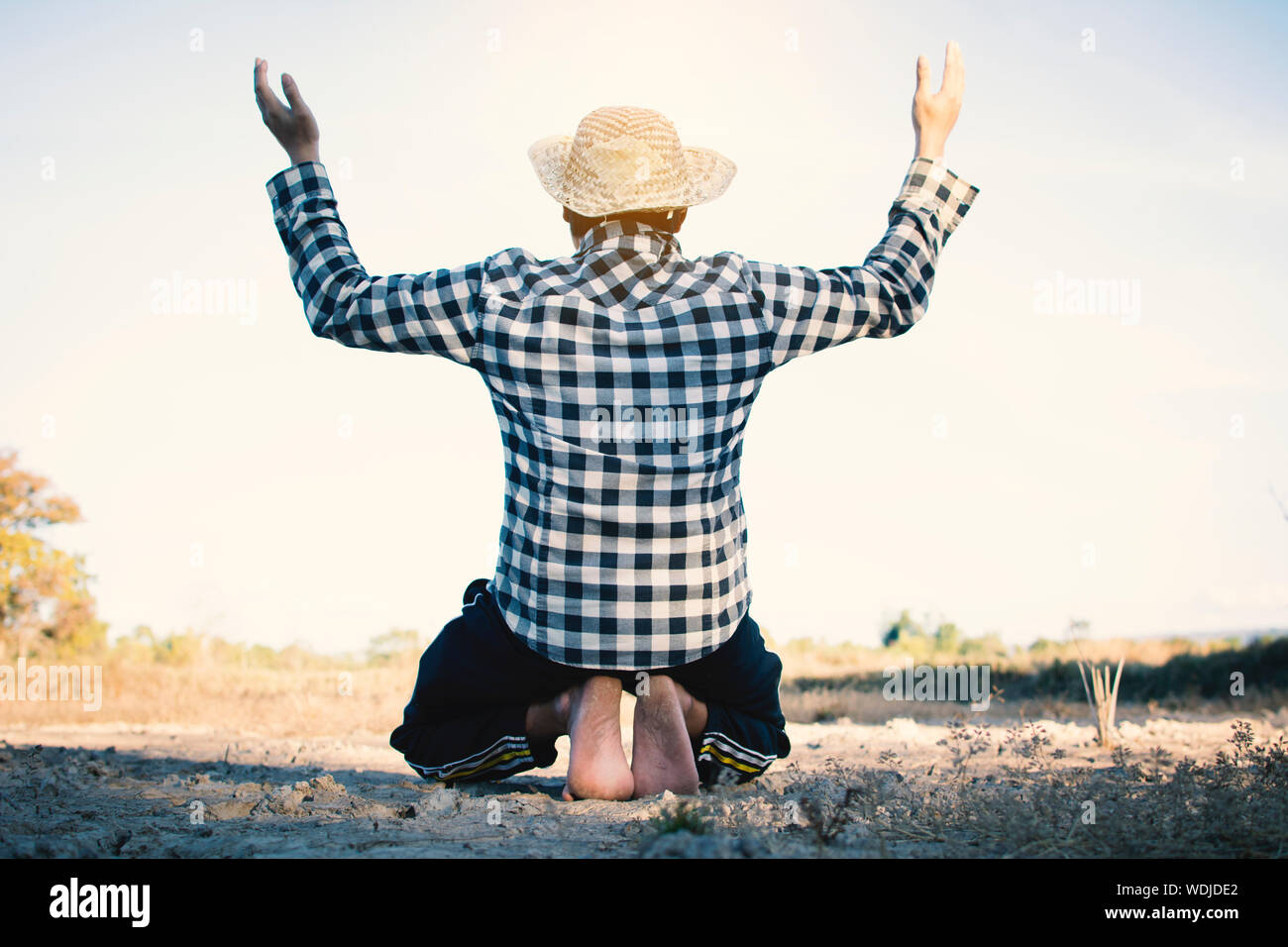 Kneeling Man Rear View High Resolution Stock Photography and Images - Alamy