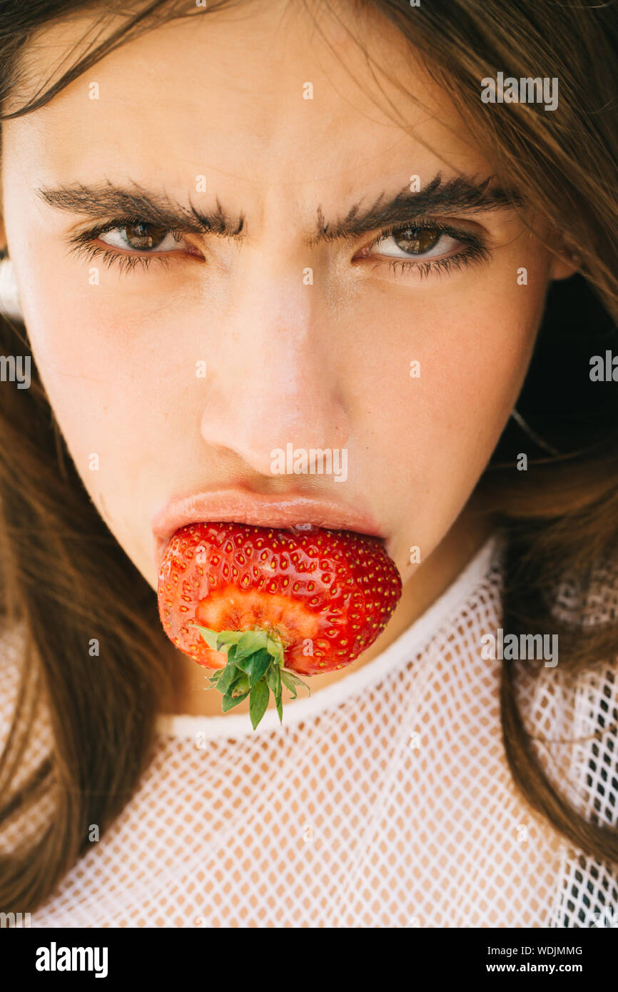 pic Strawberry Photography Close Up Lips With Fruit https www alamy com young woman with pretty face and mouth with lips eat red sweet strawberry berry fruit image266557440 html