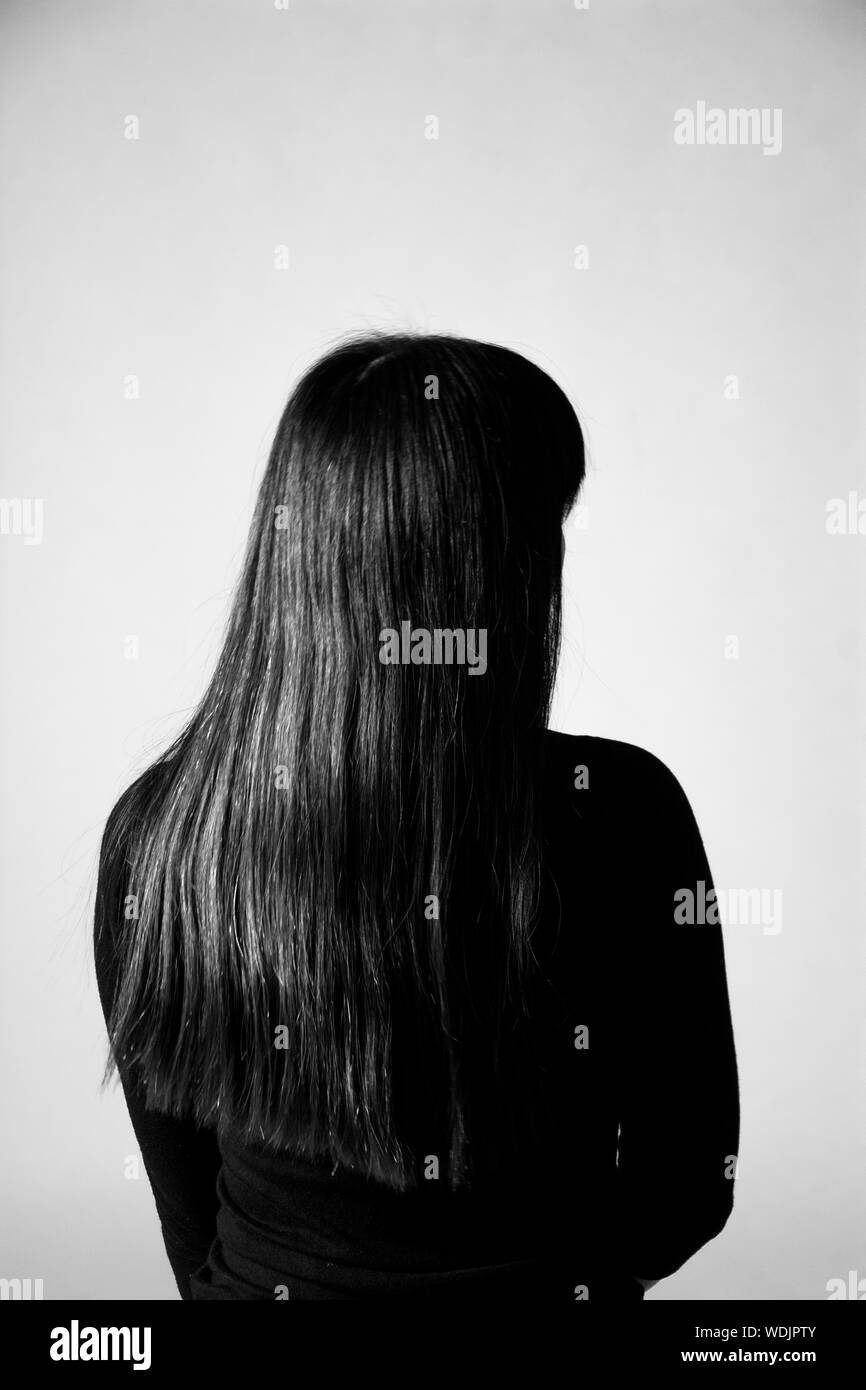 Black hair women rear view Black and White Stock Photos & Images - Alamy