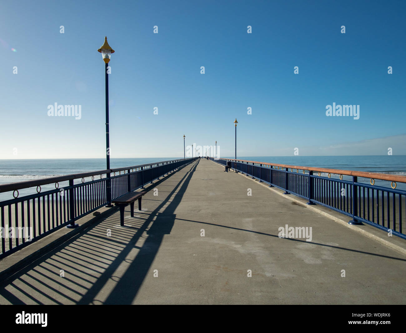 View along New Brighton pier, New Brighton beach, New Zealand Stock Photo