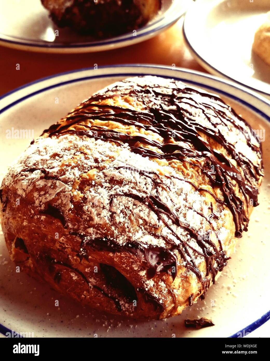 Powdered Sugar On Chocolate Croissants In Plate Stock Photo Alamy