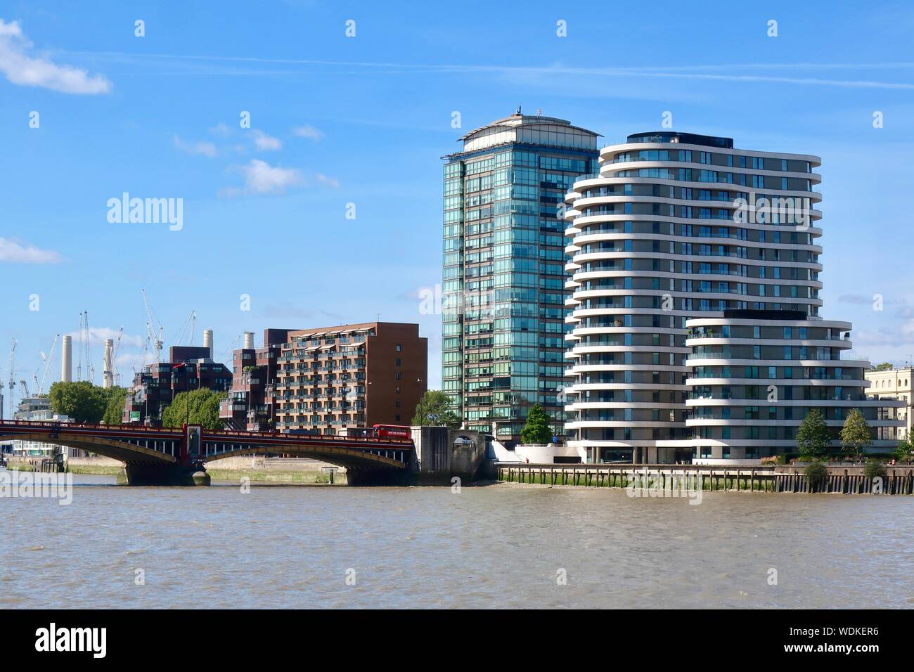London, UK - 29 August 2019: Riverside apartments on Millbank facing Vauxhall Bridge. Stock Photo