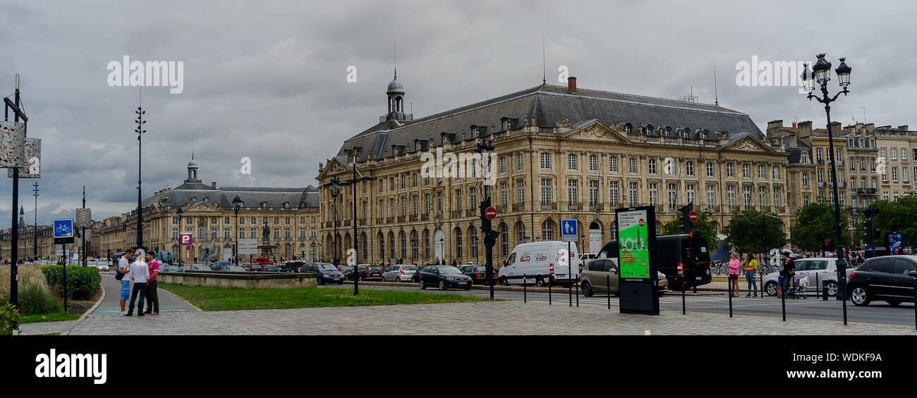 People walking through the Place de la Bourse in the city of Bordeaux, France, in September 2013 Stock Photo
